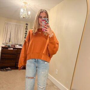 Burnt orange cropped Nike fleece sweatshirt